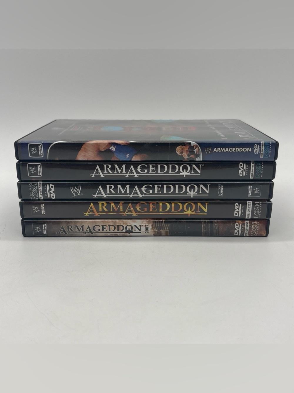 Lot of 5 WWE Armageddon 2004 x 2, 2005, 2006, 2007 DVD Bundle
